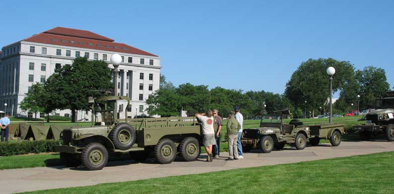 The unveiling of John Bizal's newly restored WC 62. The maiden voyage was from the parking area to the capitol. A few bugs to work out yet. The boys discussing the details at the rear.