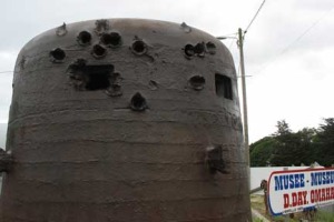 How would you like to have been stationed inside this gun post and taken all these hits? This fortificaiton was taken off the beach head.