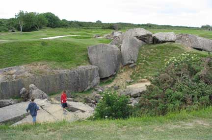 That was a gun emplacement before it got bombed. The concrete is 3-5 feet thick. You can only imagine the explosion that moved all that concrete around like that.