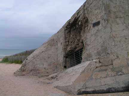 Another bunker. The damage above the window port was a direct hit. The gun is still in this bunker.