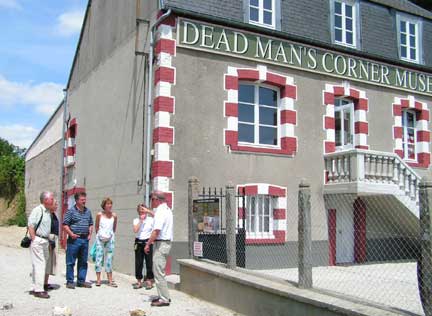 Near Saint Come du Mont is the Dead Man's Corner Museum. Mike is explaining to the group how this famous corner got its name. Here again, during the movie The Longest Day, this building, and it is still the original, was used in the film. It stood empty for a long time prior to being reopened as a musee. This was one of the nicest ones we visited.