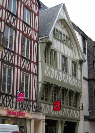 The old part of the city of Rouen is filled with this old architecture in the Norman style. Look closely and you will see the "Golden Arches" on the red flag. Yes, this is a McDonalds.