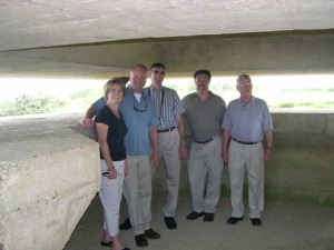 Some of us inside a German range-finding post at the Batterie de Longues Sur Mer. In the close-up on the right you see Pam & Mike, Gary, myself and Don.