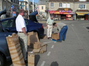 Midwest Military mobile packing service at work. Packaging our finds to ship them home. You think shipping is expensive here, try sending the parts thru the French Postal Service back home!!