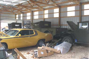 3 nice trucks in the shed that had motor pool rework done. Batteries and fuel and they drove out of the building. Real nice 440 Roadrunner clone car. Parts scattered everywhere in the building.