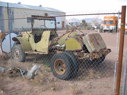 This poor thing won't even make a good parts truck. It is so hammered from its former owner's use.