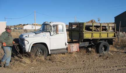 My buddy, Ryan loading the 1958 Dodge D500 he bought. That is my 1.5 ton Chevy box with all the parts. We couldn't find the rest of the Chevy.