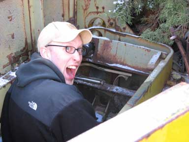 This is Jeff. He was not happy about sitting down inside a cab removing fuel tank straps. He got put to work after his Chevy parts were gathered up.