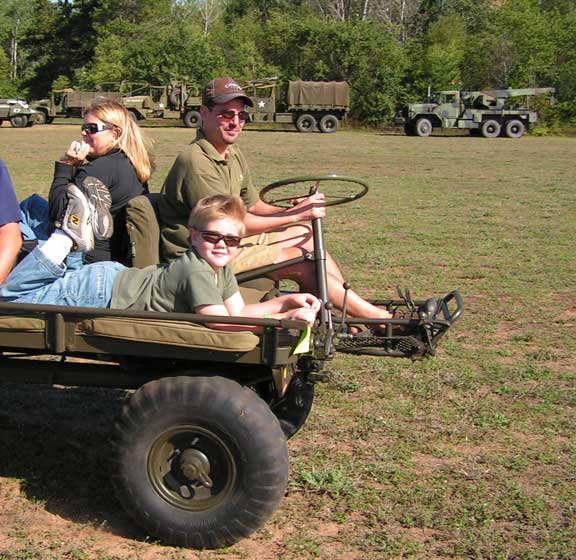 But my son's favorite is always the Mule rides. Once he is on it, you can't pry him off. Notice the firm grip he has on the railing.