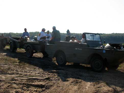 Part of the Spooner Yacht Club being launched. Roger Hirschberger's GPA doing the towing.