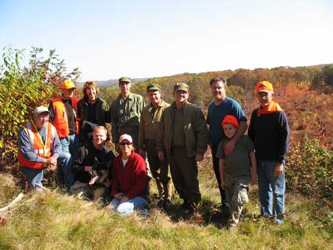 Our trail ride crew. That's me holding on to my "mini me" son, Braden! We wore blaze orange that day because the state youth hunt was on. Photo on the right is a good shot of two cousins.