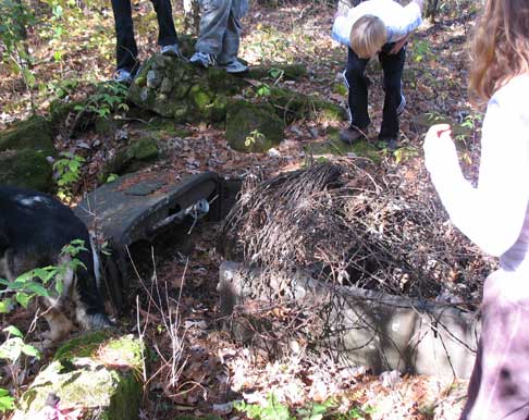 Can you tell what it is? We discovered an early 1920's or 30"s touring sedan in the ruins of an old farm building. Surprisingly, the sheet metal was in great condition. There is talk of doing an achealogical dig in the spring.