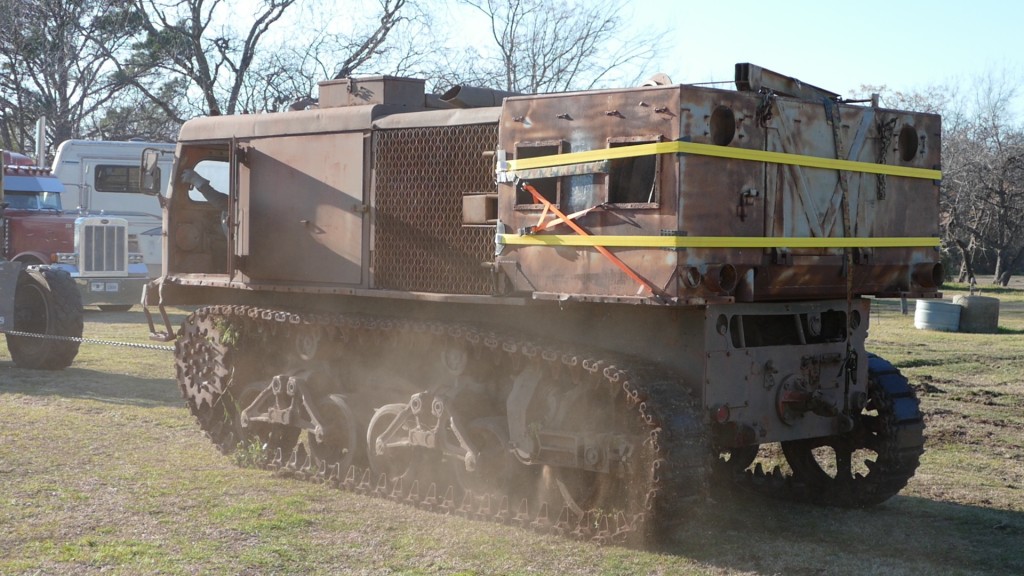 Forklift pulled it easily. Tracks shook the dirt and debris right out.