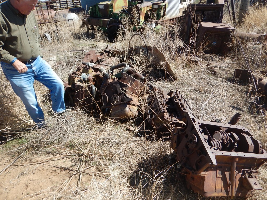 Our arrival and quick view of the yard. Here Don is looking at Stuart tank Cadillac engines. There were a bunch of them, but only 4 complete.