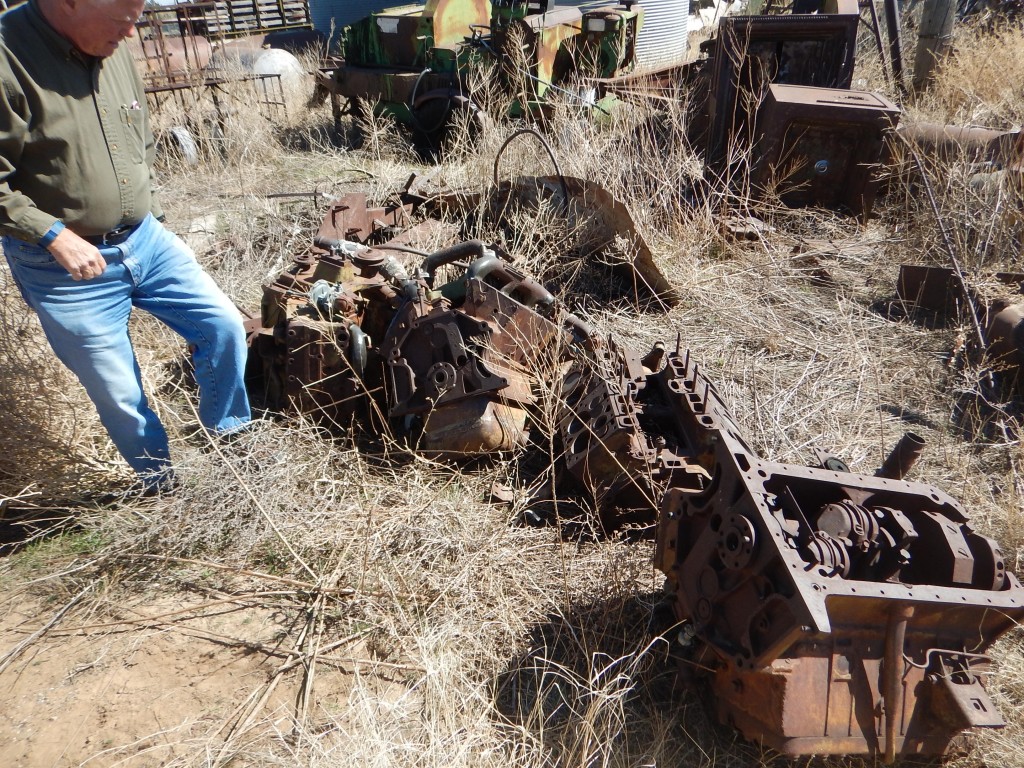 Our arrival and quick view of the yard. Here Don is looking at Stuart tank Cadillac engines. There were a bunch of them, but only 4 complete.