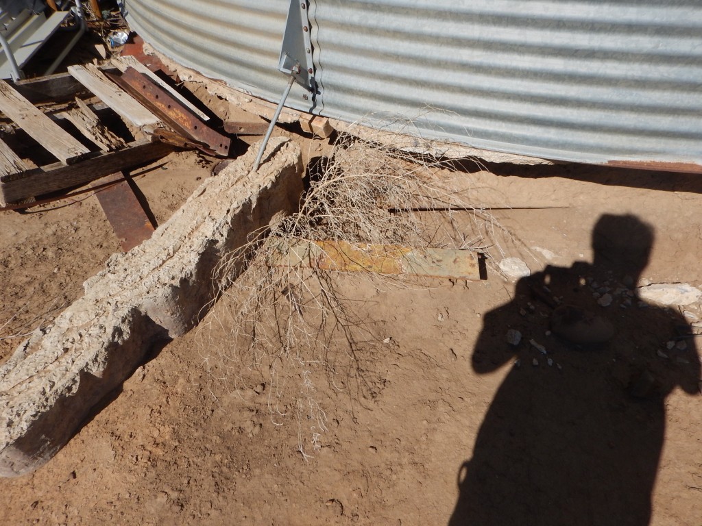 A louvre stuck in concrete.  We got it out!  