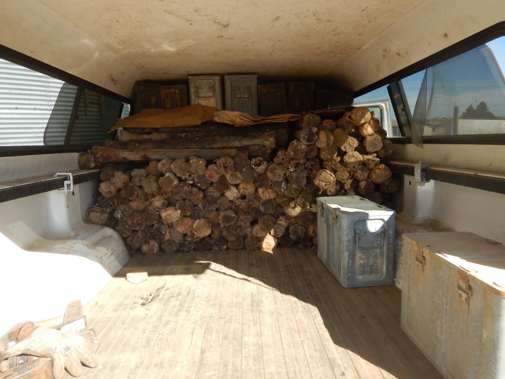 Filling the truck.  1/2 ton Dodge drive shafts, 20mm ammo cans.